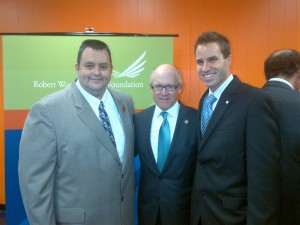 Highlands Mayor Frank Nolan, Jets owner Woody Johnson, and Douglas Eagles, Executive Director of the Boys and Girls Club of Monmouth County.