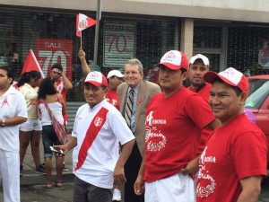Jeff Bell marching in the Passaic Peruvian Day Parade last month. Bell doesn't do selfies